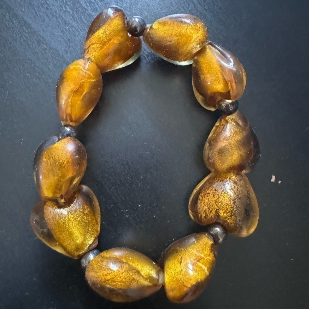 Yellow /‎ gold toned heart costume bracelet